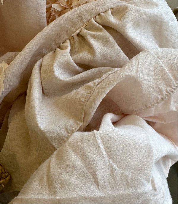 Blush pink fabric with 3D floral design from The Matilda Dress.