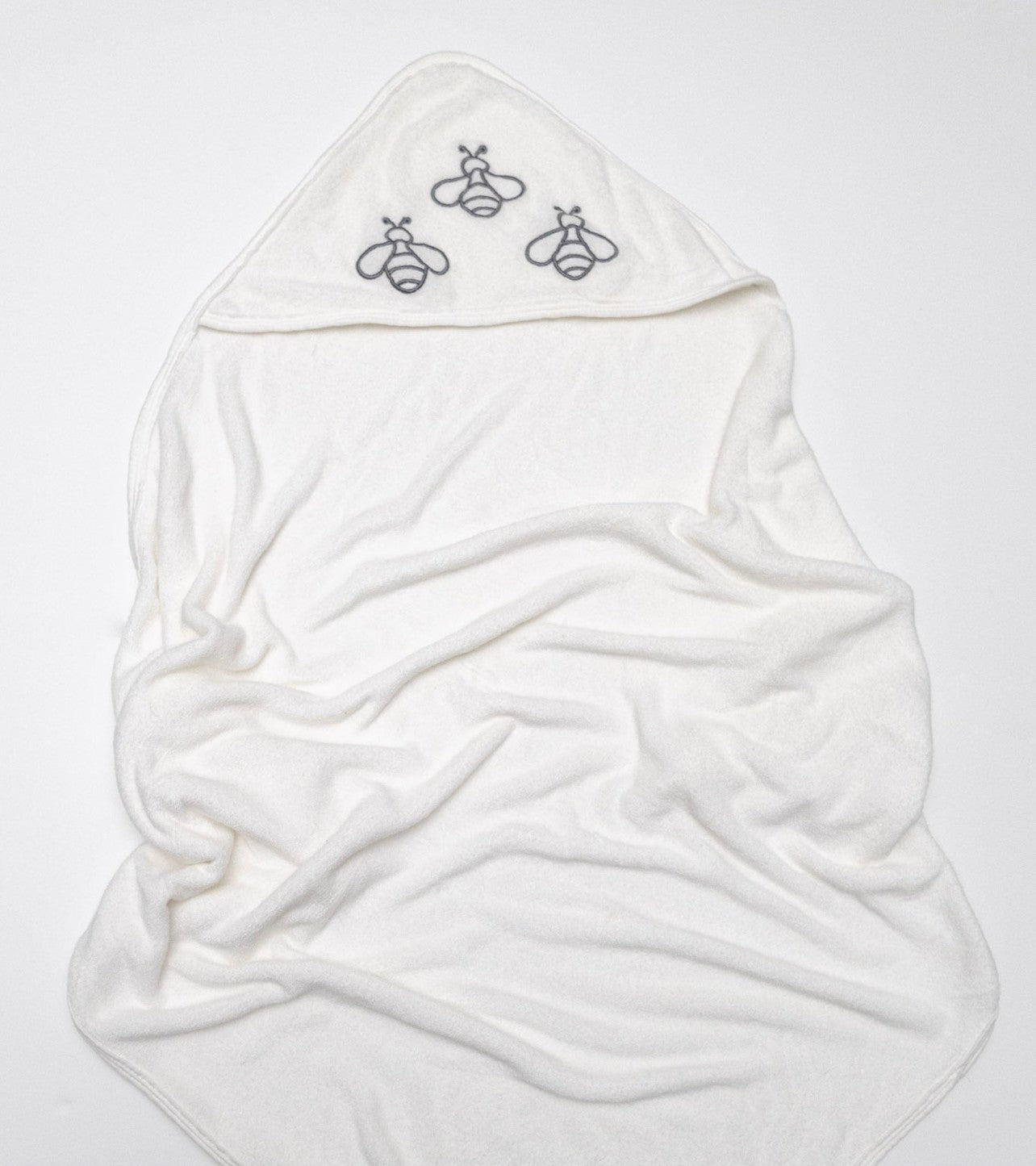 Baby Buzz Bath Towel with cozy hood and bee design, eco-friendly bamboo material.