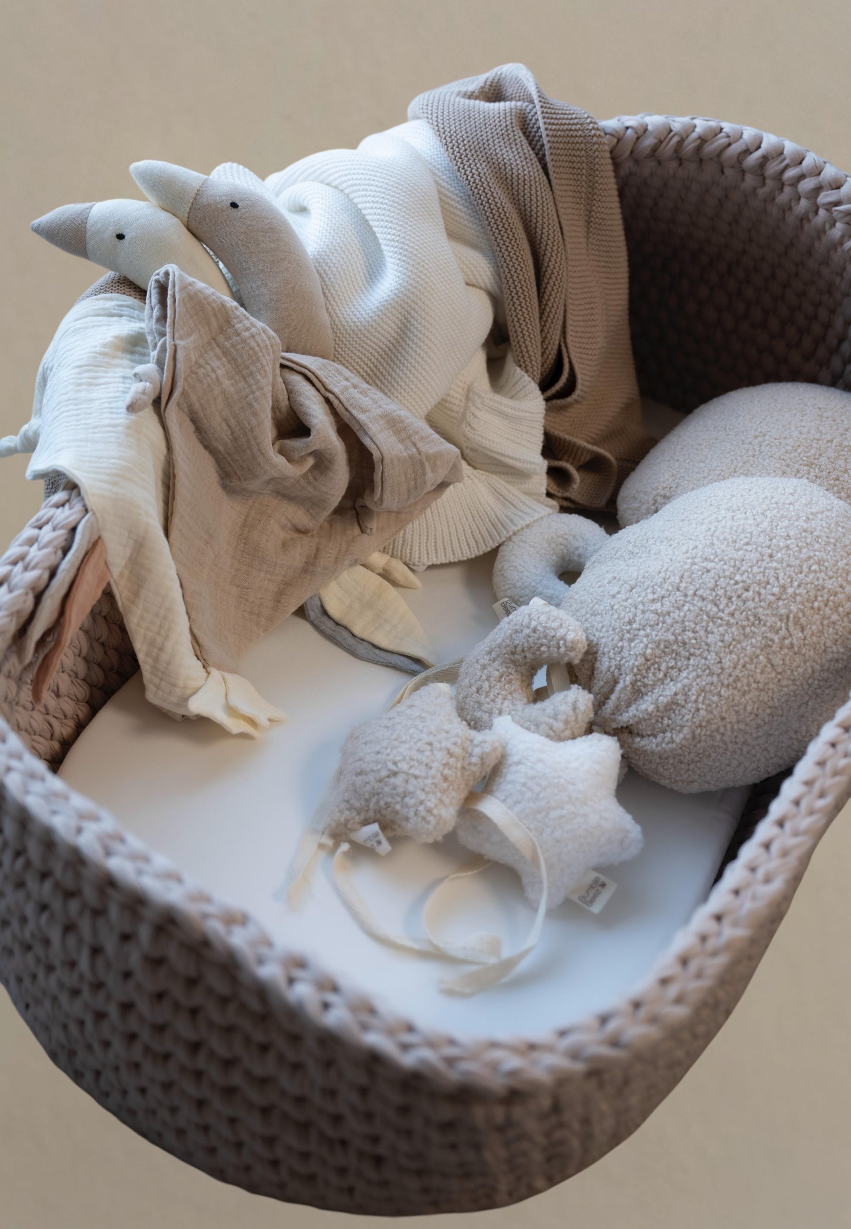 Neutral biscuit bouclé balloon-shaped decorative nursery cushion with soft textured fabric and playful charm