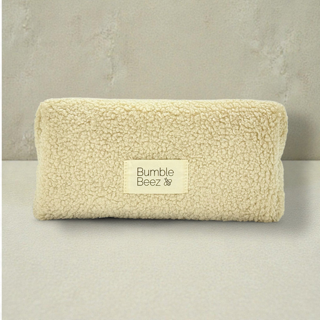 The Boucle Bathroom Bag soft cream boucle fabric toiletry pouch with zip closure