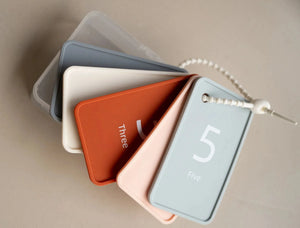 Set of soft silicone number flash cards 1 to 5 with attached loop for easy carrying and sensory play.
