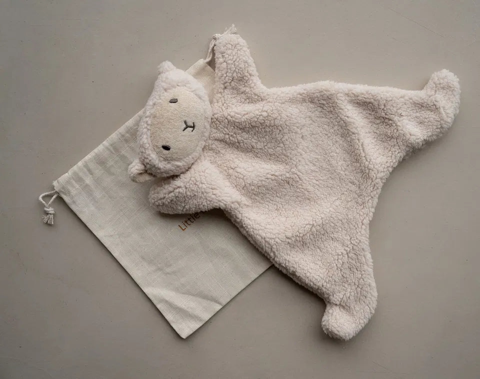 Little Snuggler baby comforter in soft faux lamb wool with embroidered lamb face and cuddly texture on beige background