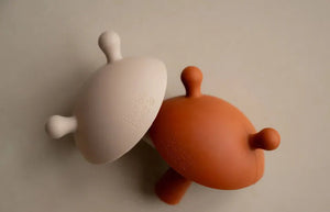 The Mushroom Teething Wand soft silicone baby teethers in cinnamon and biscuit colors for infants
