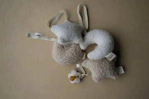 Sensory Moon And Stars boucle fabric baby pacifier clip and nursery decor in Milk and Biscuit tones